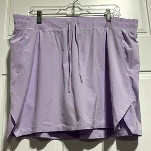 All In Motion Skort, boxer lined. elastic drawstring waist,hip pockets,slit side